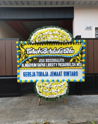 Papan Bunga Duka di Tiris
