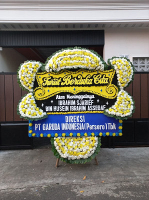 Papan Bunga Duka di Tiris