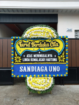 Papan Bunga Duka di Tiris