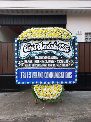 Papan Bunga Duka di Tiris